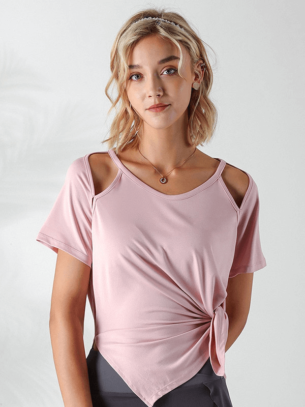 Model wearing pink women's loose hollow-out shoulders t-shirt for running, showcasing breathable fabric and stylish design - SF1289.